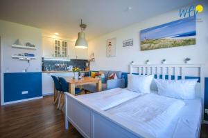 Haus Richthofenstraße 20 e Ferienwohnung Dünenwind