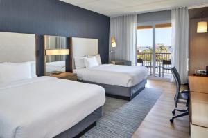 Queen Room with Two Queen Beds, Partial Water View and Balcony room in Courtyard by Marriott St. Petersburg Clearwater/Madeira Beach