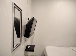 Gangnam Style Residence Mitra RedDoorz near MERR Surabaya