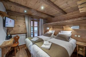 B&B / Chambres d'hotes Chalet K120 - Village du Praz - Courchevel : Chambre Double ou Lits Jumeaux avec Terrasse