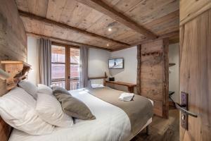 B&B / Chambres d'hotes Chalet K120 - Village du Praz - Courchevel : photos des chambres