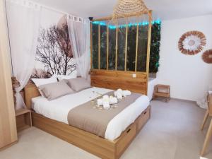 Appartements La Suite Balinaise * Balneo : photos des chambres