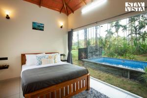 StayVista at Palm Tree Homes with Complimentary Breakfast, BBQ Grill and Pet-Friendly Home