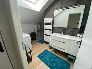 Appartements Appartement Style Loft 100m² : photos des chambres