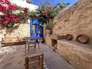 Casa con vistas al mar y Patio de Buganvillas