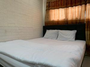 RedLiving Apartemen Sentra Timur - YN Idea Property Tower Kuning