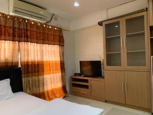 RedLiving Apartemen Sentra Timur - YN Idea Property Tower Kuning