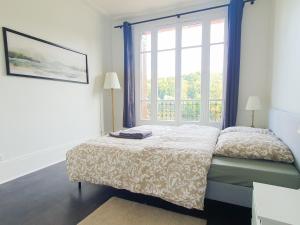 Maisons de vacances EXIGEHOME - Grande maison en bord d-etang a 20 min de Paris : photos des chambres