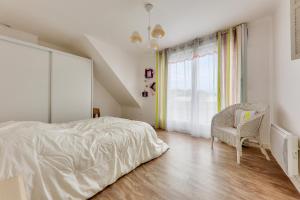 Maisons de vacances Maison pour 8 - Piscine - 550 m de la plage : photos des chambres