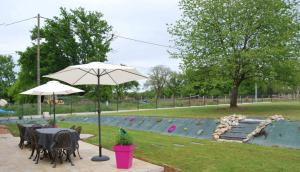 Sejours a la campagne Arnage Corner Lodge Piscine 20pers : photos des chambres