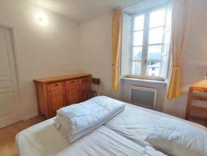 Appartements Logement a proximite des telecabines et en face du parc des thermes : photos des chambres