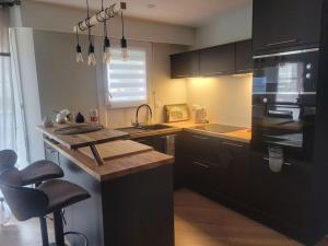 Appartements Magnifique T2 meuble au pied du port : photos des chambres