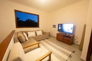 Conforto na Praia do Puruba - 5 quartos, completa, 200m do mar