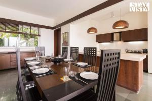 StayVistas Oceanic Retreat - Beach-View Villa with Outdoor Pool, Lawn & Indoor-Outdoor Activities