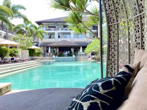 119 Santai Resort - Poolside Apartment by uHoliday