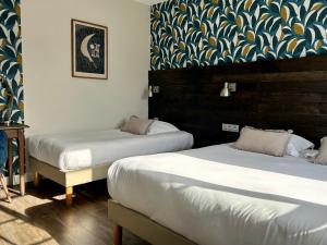 Hotels LOGIS Hotel St Sylvestre : photos des chambres