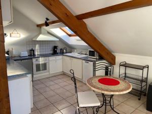 Appartements La Roseliere : photos des chambres