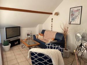 Appartements La Roseliere : photos des chambres