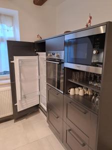 Appartements Gite premium, au Coeur de l'Ours : photos des chambres