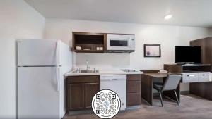Queen Room with Two Queen Beds - Accessible/Non-Smoking  room in WoodSpring Suites Dallas Plano Central Legacy Drive