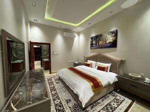 شقة فاخرة غرفة وصالة النرجس ١٨