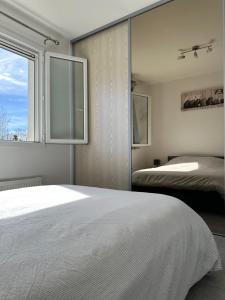 Appartements Bienvenue chez Sophie & Thomas : photos des chambres