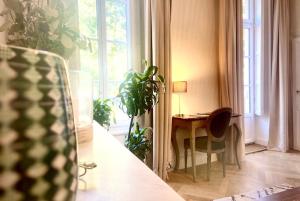Appartements Le Questel au coeur de la cite romaine avec clim : photos des chambres