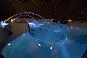 Appartements Studio les 2 fees - Jacuzzi et Decoration Enchantee : photos des chambres
