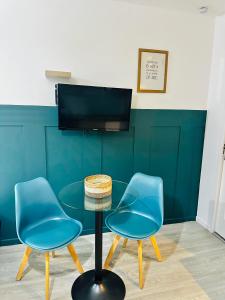 Appartements BtoBed - Studios Paris Le Bourget : photos des chambres