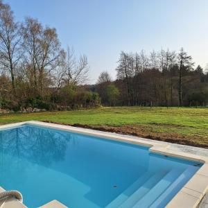 Maisons de vacances les granges de Soulagnieux et sa piscine privee : photos des chambres