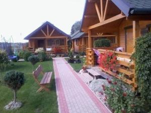 Ferienhaus in Rusinowo mit Grill, Terrasse und Garten