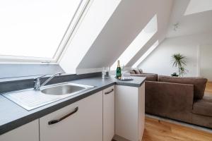 SYMPHONY Apartments 39 - Modern Loft with Terrace and Grill in Central Location