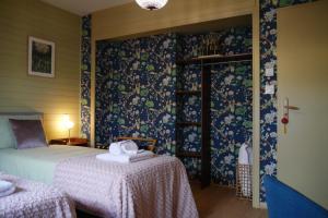B&B / Chambres d'hotes Chambres d-Hotes La mesange a tete Bleue : photos des chambres
