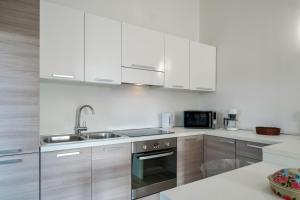 Casa Lugana 15 - Monolocale con piscina fronte lago