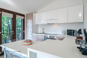 Casa Lugana 15 - Monolocale con piscina fronte lago