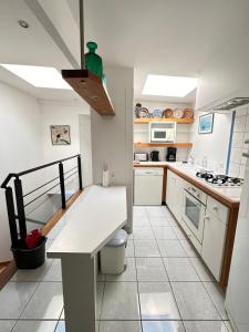 Maisons de vacances Charmante maison les pieds dans l'eau : photos des chambres