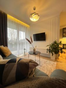 Apartamenty Kielce- Apartament Komfort przy Baseny Tropikalne, Kadzielnia, parking, faktura, centrum
