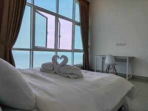 Invincible Seaview Vacation Condo 3R3B 8Pax