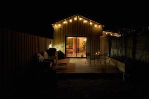 Maisons de vacances L'ilot du 9 - Cabane & spa au bord du lac : photos des chambres