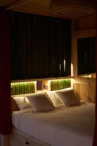 Maisons de vacances L'ilot du 9 - Cabane & spa au bord du lac : photos des chambres