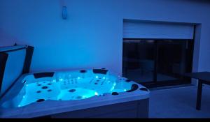 Villas Maison bord de mer avec Jacuzzi : photos des chambres