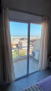 Cómodo dúplex frente al mar