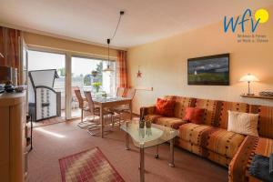 Haus Kiebitz Ferienwohnung "Strandkoerbchen"