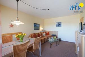 Haus Kiebitz Ferienwohnung "Strandkoerbchen"