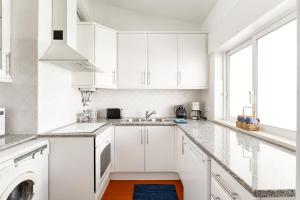 Acolhedor apartamento com Wifi a passos do Mar