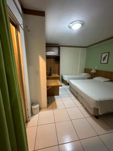 Resort Golden Dolphin Grand Hotel 517 - com roupa de cama e banho