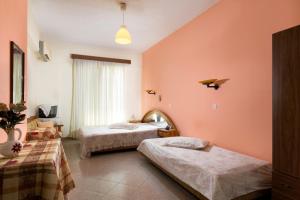 Cozy Archangelos apartments with private parking