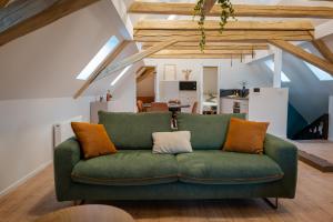 Appartements Le 1552 - Gite de charme - Parking Gratuit : photos des chambres