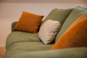 Appartements Le 1552 - Gite de charme - Parking Gratuit : photos des chambres