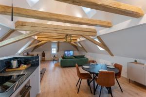 Appartements Le 1552 - Gite de charme - Parking Gratuit : photos des chambres
